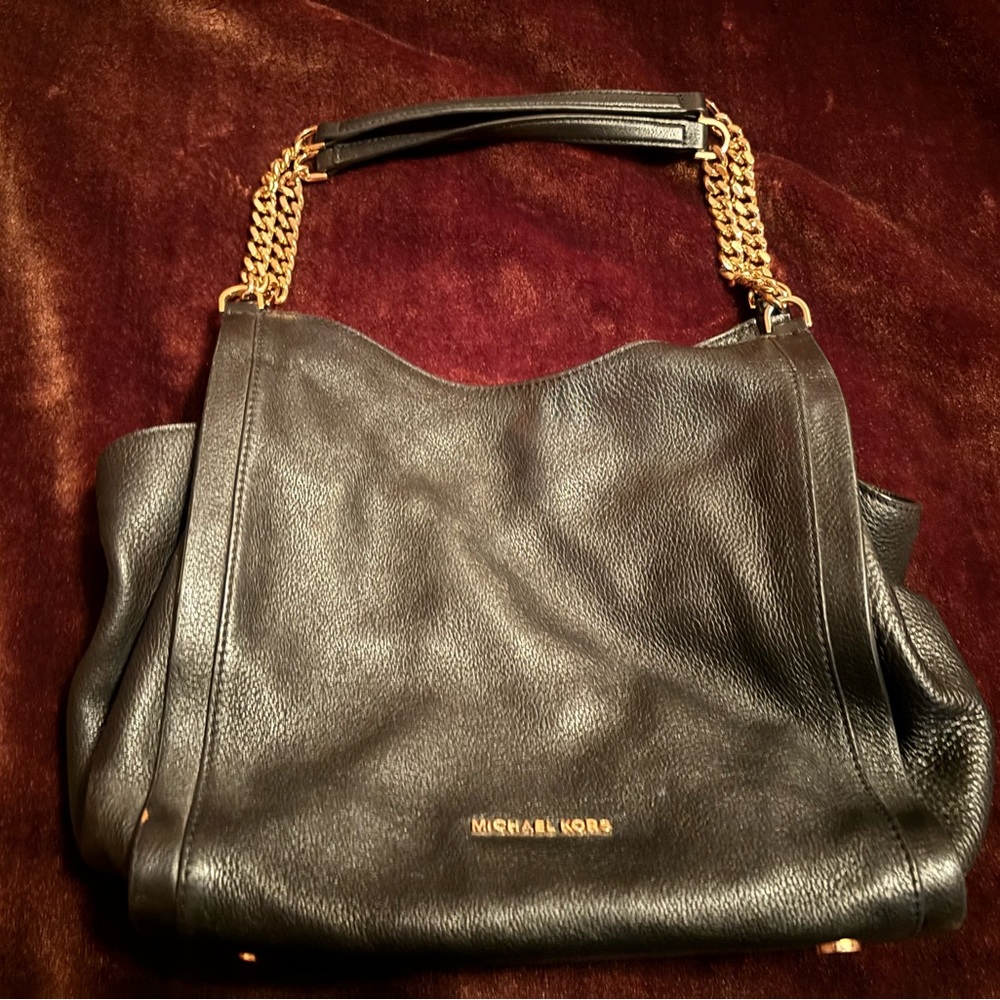 Michael Kors handbag. Well taken care of. Wonderful condition.